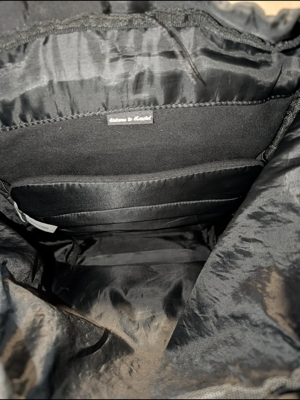 Herschel Supply Company Black Sling Bag with Red Accent Pull
